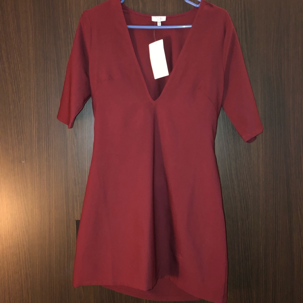 Burgundy mini dress with midi open back